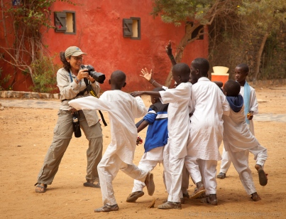 Exuberant children posing for photos, Goree Island, Senegal. [NO MODEL RELEASE]