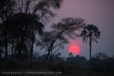 Red sun going down in the Okavango Delta.
